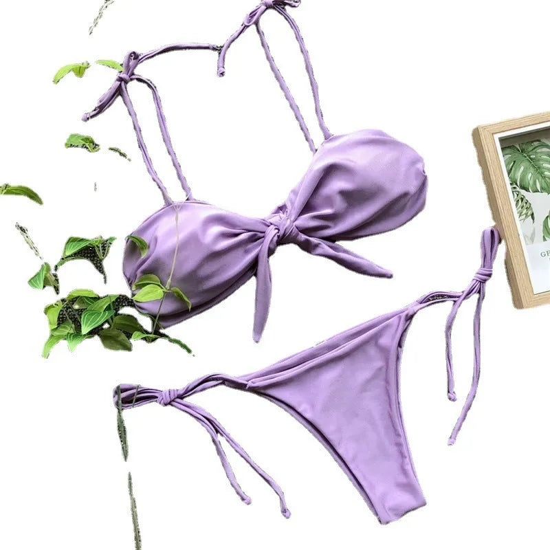Women's three-point bikini swimsuit in purple stripe with polyester lining and backless design, sizes S M L.