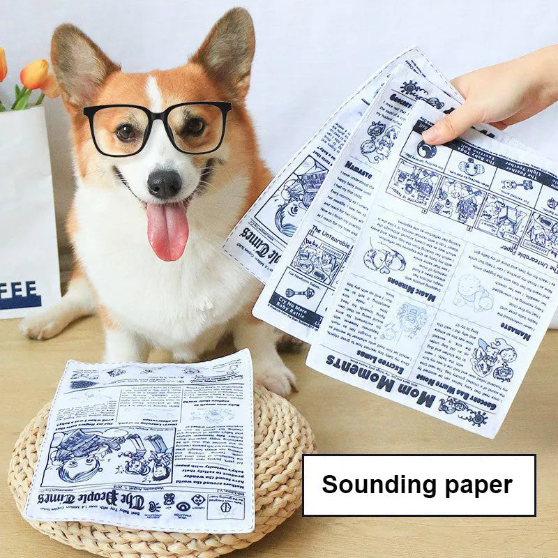 Tearproof dog toy with playing card design featuring simulated newspaper squeak sound mechanism