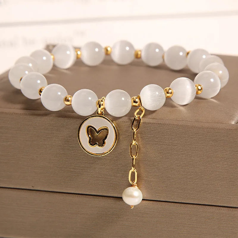 Korean-style white cat's eye crystal bracelet with geometric health care design
