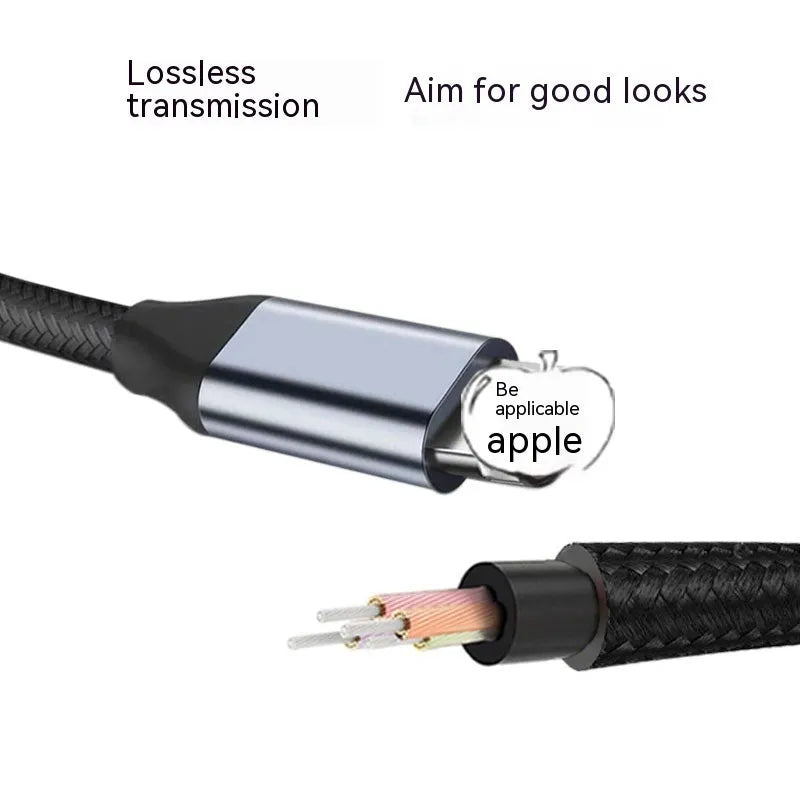 Black braided Lightning to 3.5mm male AUX audio adapter cable on white background