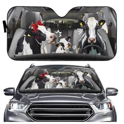 Telescopic aluminium foil car sun shield extended on a vehicle windscreen