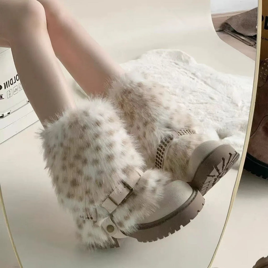 Women's winter snow boots in beige with artificial plush upper, thick rubber sole, and mid-calf shaft