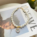 Retro love crystal pendant pet necklace with imitation pearl beads on a cat, available in multiple colours and sizes S, M, L