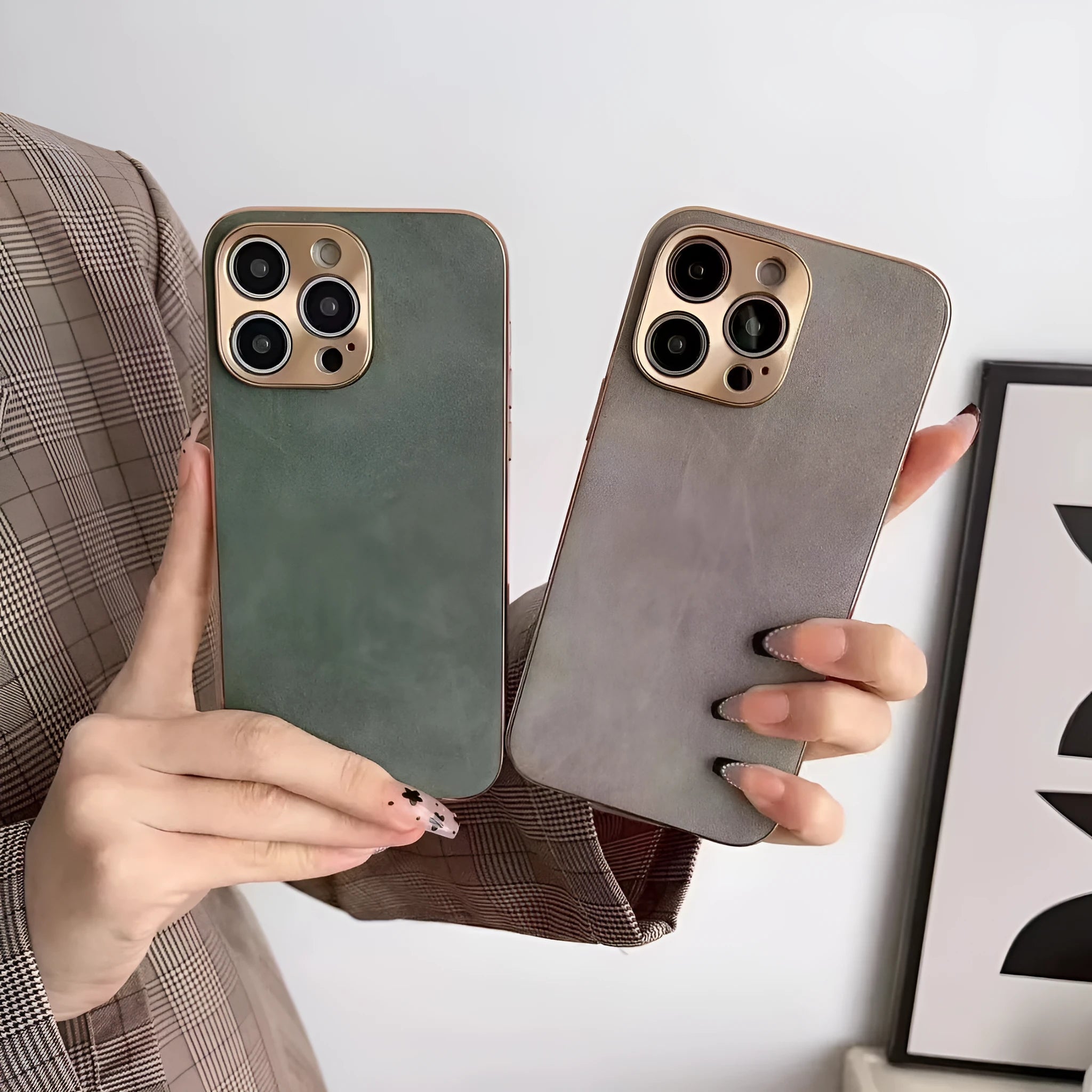 Slim grey leather texture TPU phone case for iPhone showing raised bezel around screen and camera.