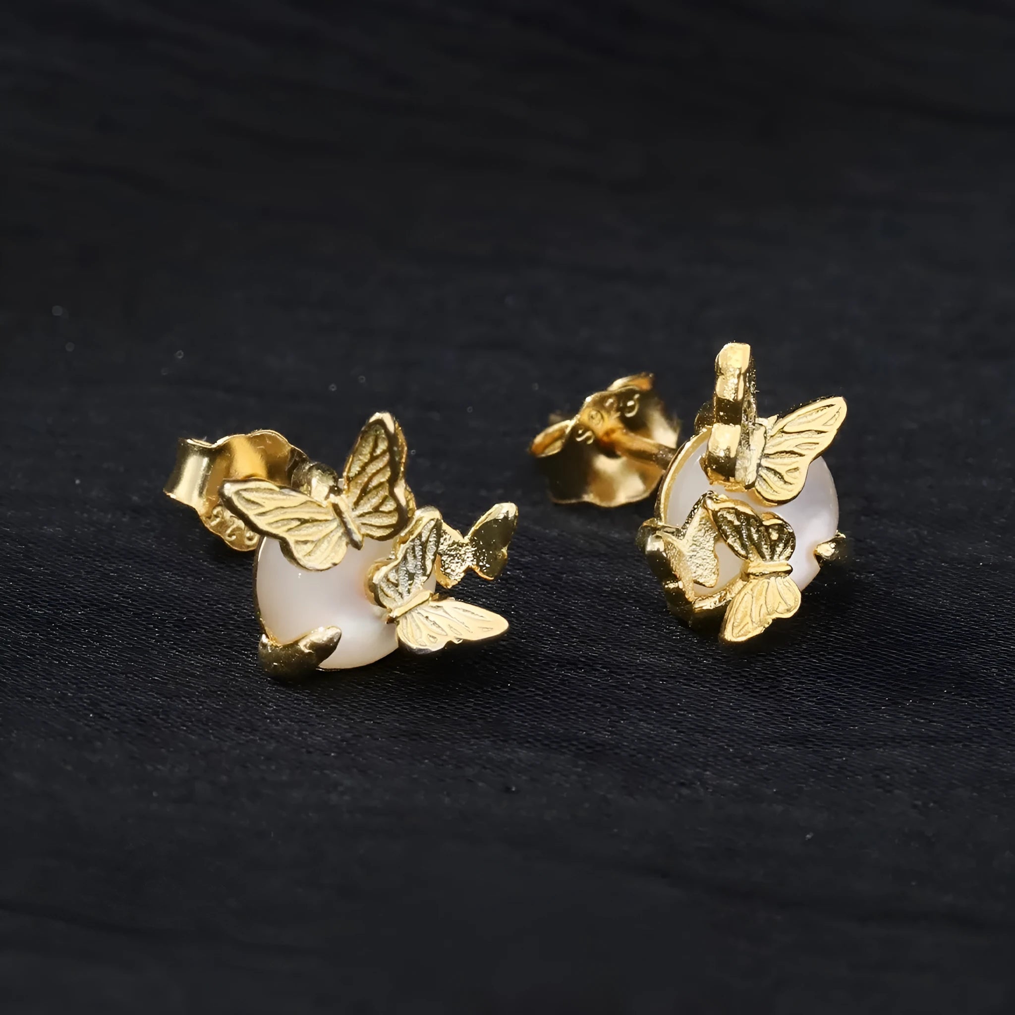 Butterfly design ear studs in 925 silver with gold or white gold electroplated finish