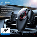 Black car air vent phone bracket with adjustable clamp arms mounted on vehicle ventilation system