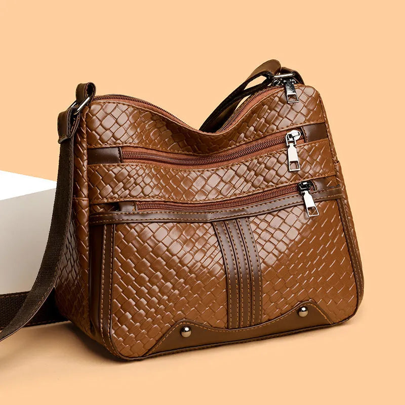 Woven texture messenger bag with multi-compartment internal organisation and single shoulder strap