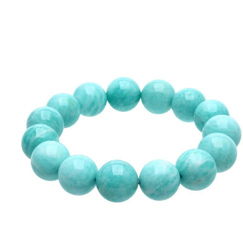 Natural blue-green amazonite gemstone bracelet with round polished beads on a white background.