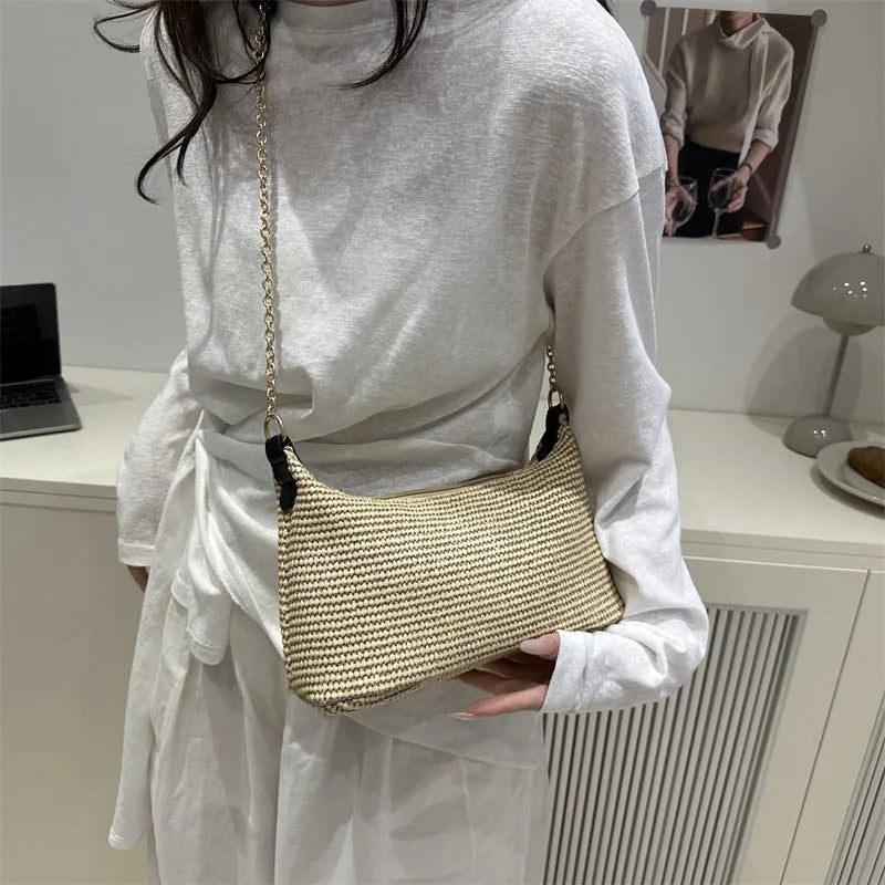 Straw woven beach shoulder tote bag in black colour with polyester lining and sandwich pockets