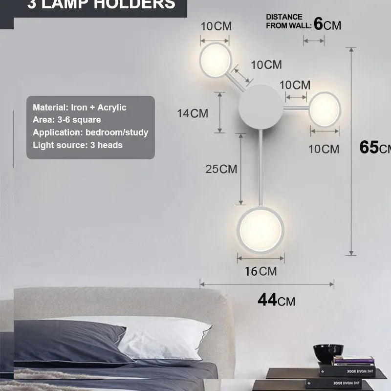 Contracted designer wall lamp with 6 heads in black iron and acrylic mounted on a bedroom wall