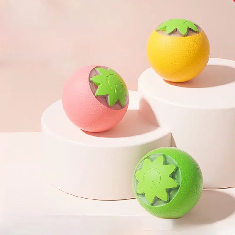 Green automatic rolling ball pet toy for cats and dogs measuring 4.5cm cube