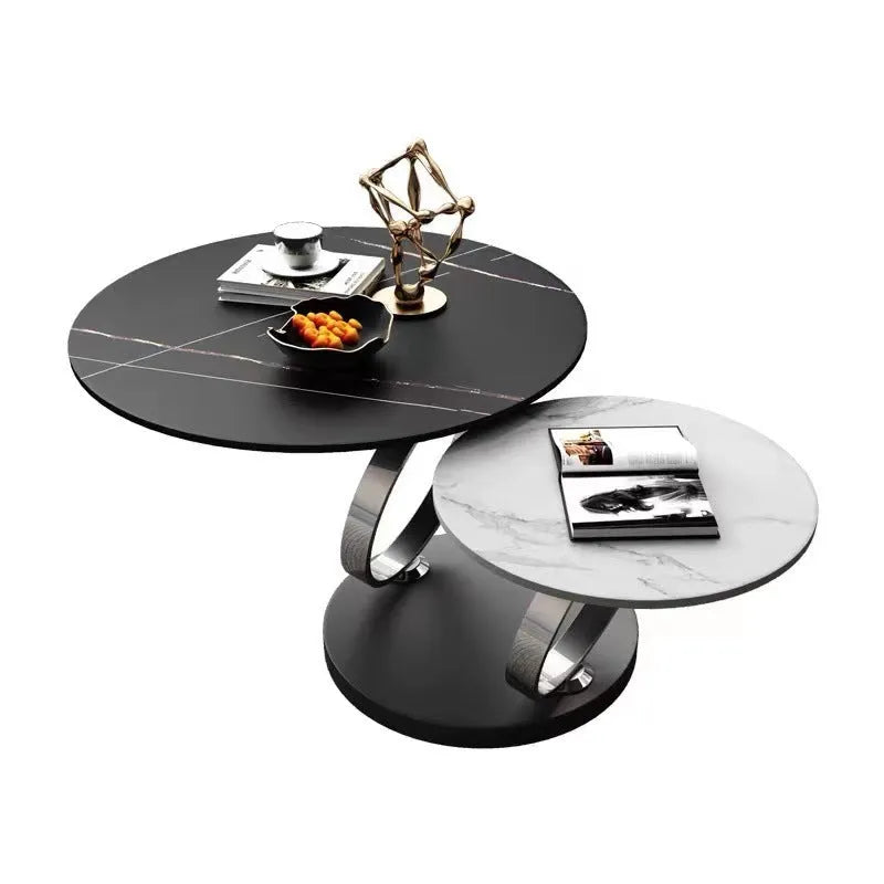 Round rotary folding table with slate top in black and white, set in a living room
