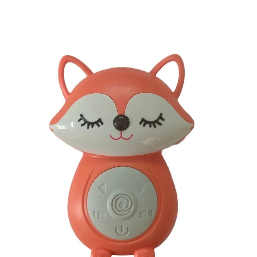 Koala-shaped infant white noise player toy in fox colour on a surface