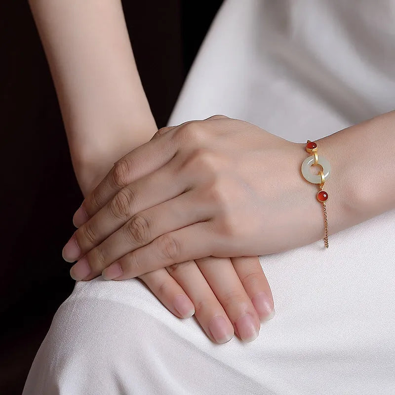 Women's silver and gold-plated bracelet with Hetian jade inlay and peace symbol buckle on adjustable band