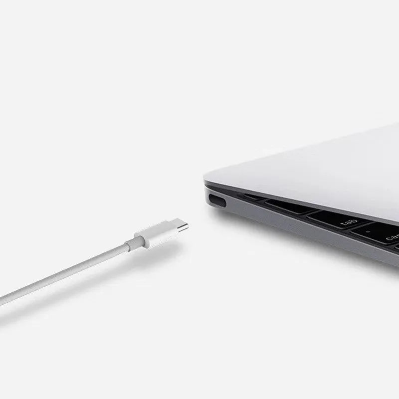 White USB-C to USB-C charging and data cable for Apple MacBook laptop, shown in 1 metre and 1.5 metre length options.