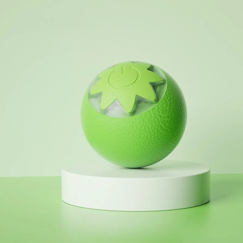 Green automatic rolling ball pet toy for cats and dogs measuring 4.5cm cube