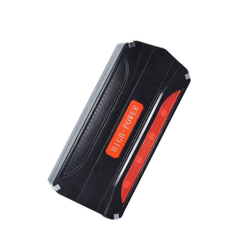Black and red portable 12V vehicle jump starter power pack with carrying case.