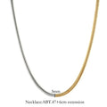 Golden stainless steel snake bone chain necklace with lobster clasp on a dark background.