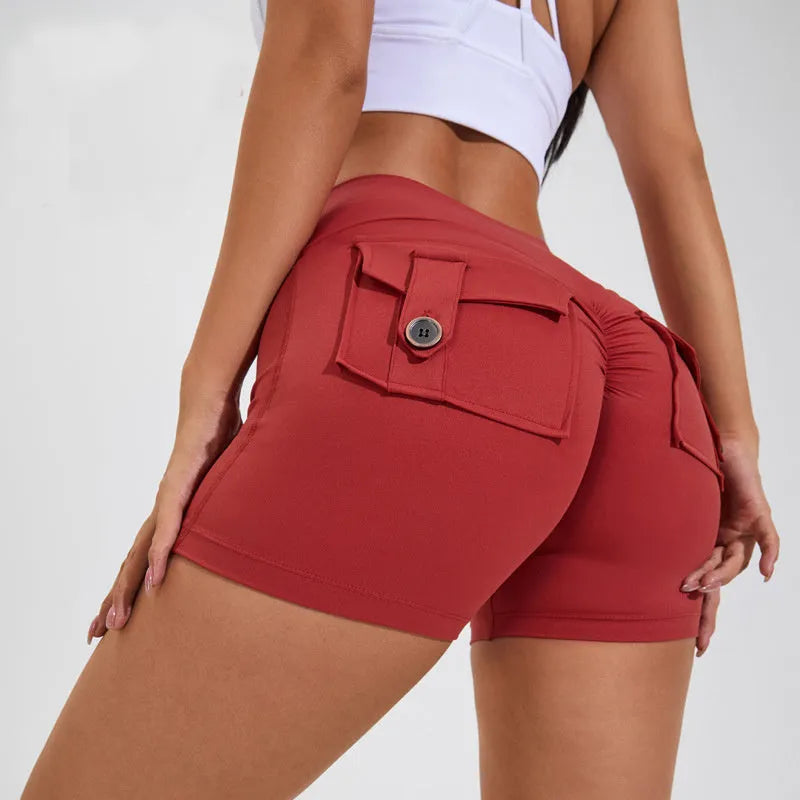 Women's high waist hip lifting shorts in electric blue colour with pockets for fitness activities