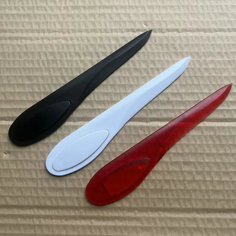 Willow Leaf Art A4 plastic paper cutter with colourful handle on white background