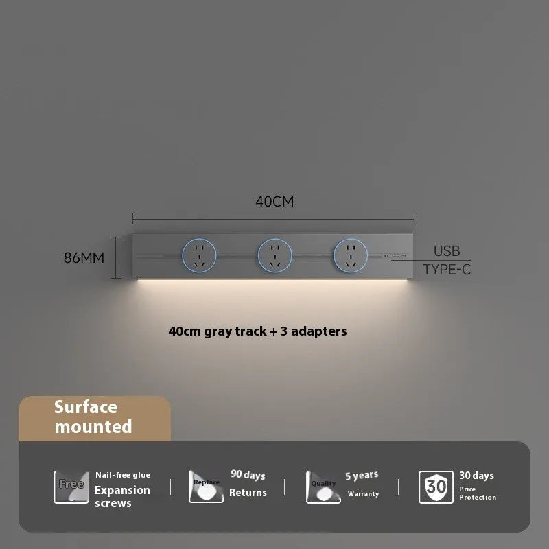Induction lamp rail socket in black on a sideboard cabinet track with white background