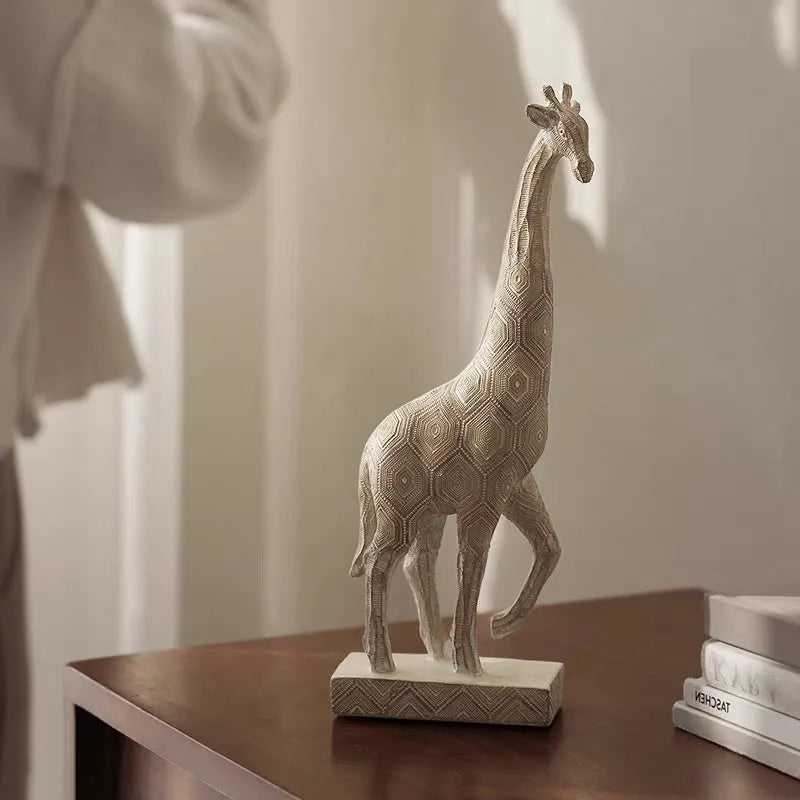 Wood colour European style giraffe resin ornament on a surface.