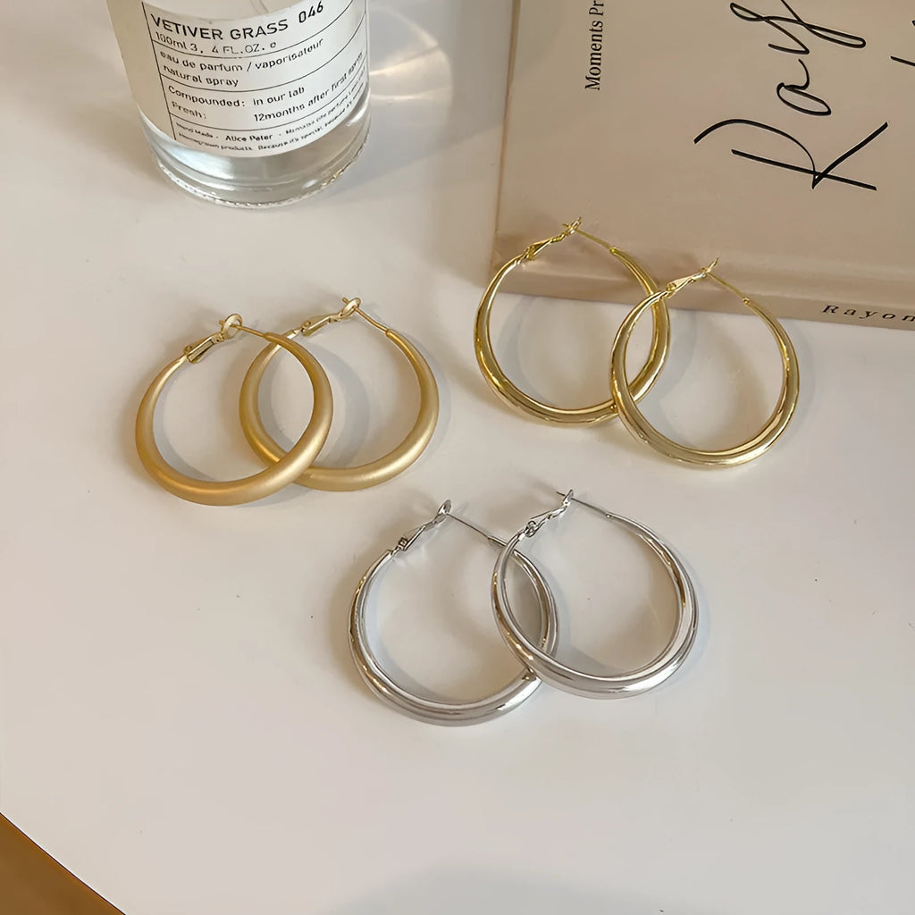 Women's copper circle large earrings in silver gold and matte gold geometric minimalist design