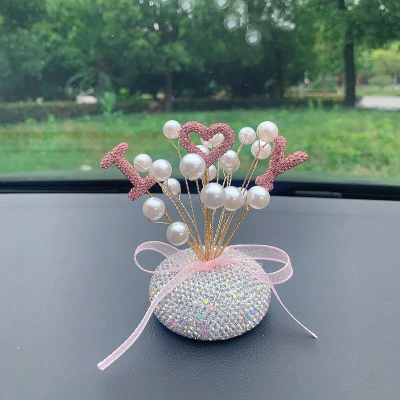 Clay star car decoration ornament for centre console in various red, pink, and pearl white colour designs.