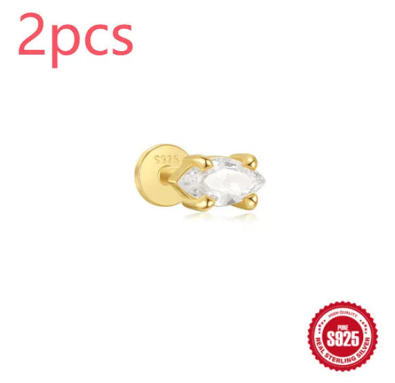 S925 sterling silver ear stud with XINGX inlaid tassel design in a gold colour.