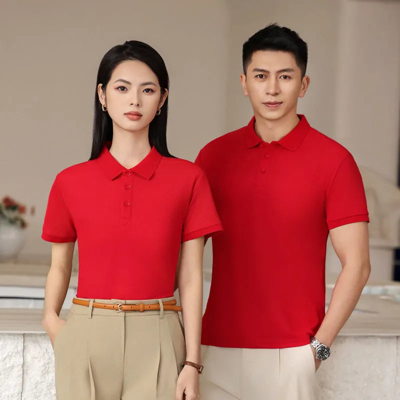 Long-staple cotton summer polo shirt on a hanger, shown in emerald green colour with short sleeves and a slit detail.