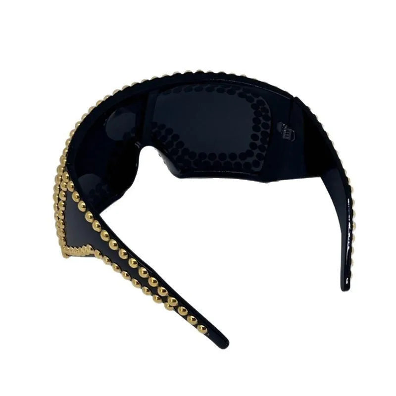Men's silver square sunglasses with large 140mm rim and rivet details on black background.