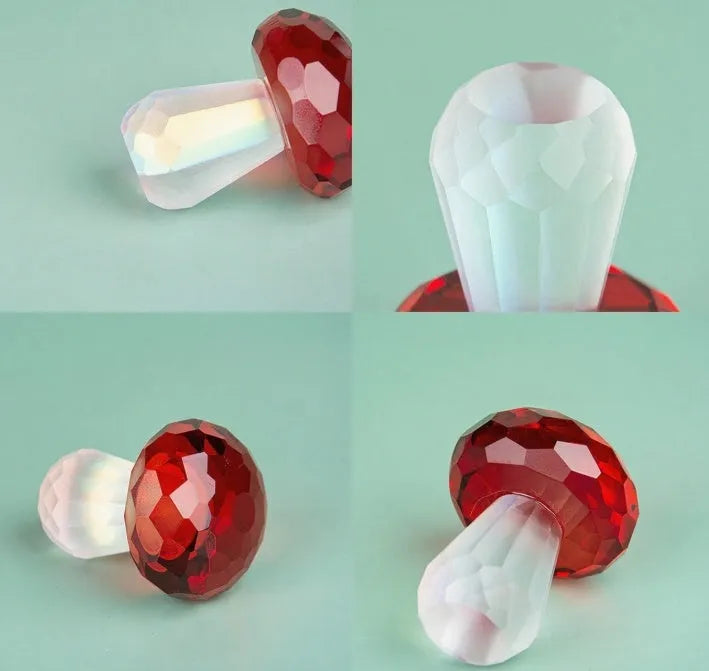 Colourful geometric crystal mushroom decoration in transparent, green, red, or yellow, 40mm by 53mm.