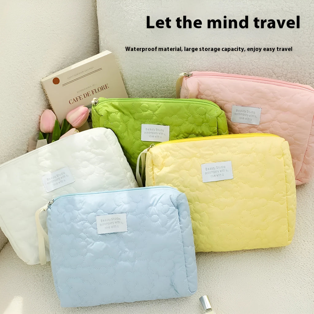 Quilted candy colour silk cosmetic bag for women showing pink, yellow, blue, white and green options