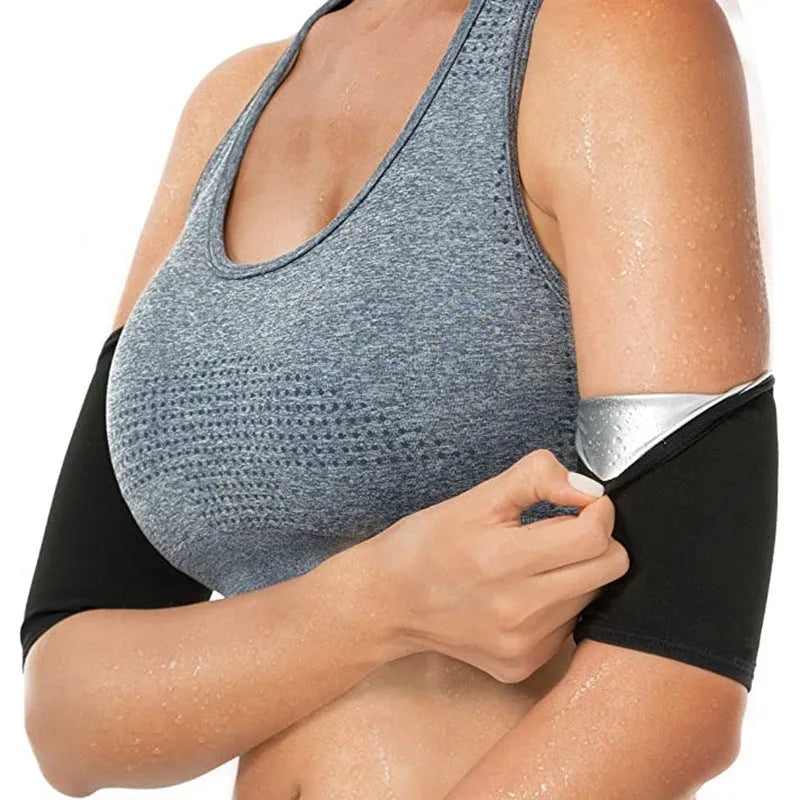 Adjustable black and red neoprene arm sweatband with Velcro strap wrapped around an upper arm.