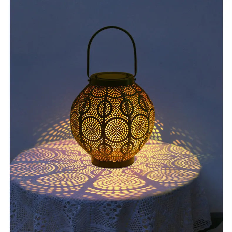 Solar powered outdoor courtyard lamp with decorative iron hollow design and integrated solar panel