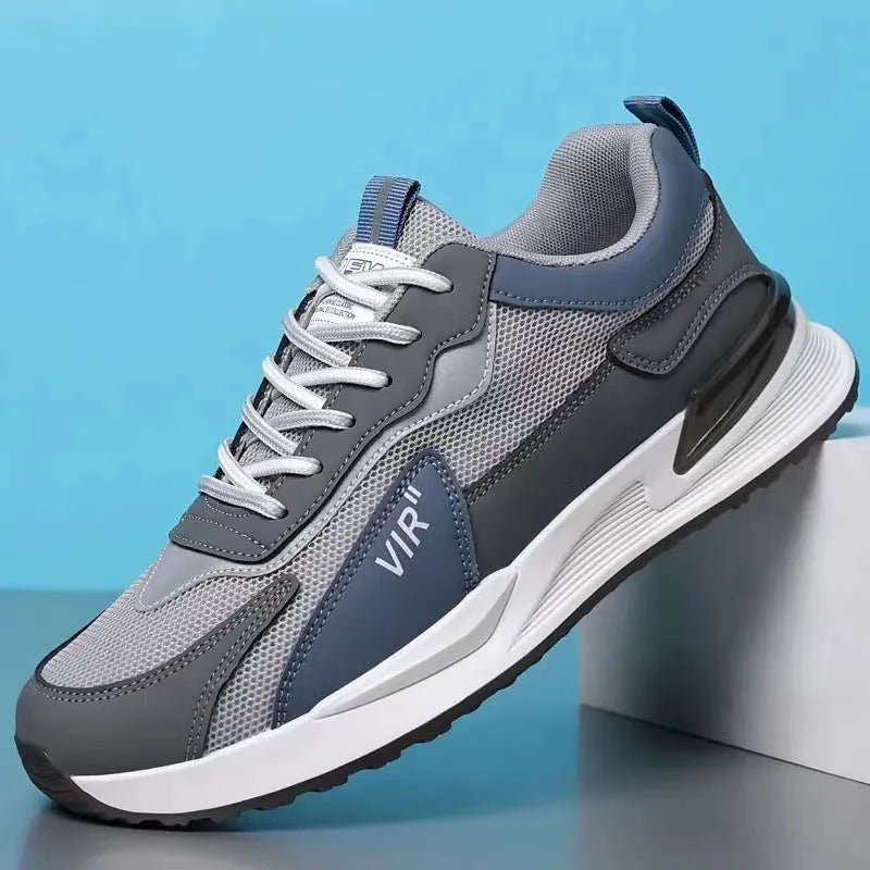 Men's black and grey colour block mesh running shoes with white soles on a plain background.