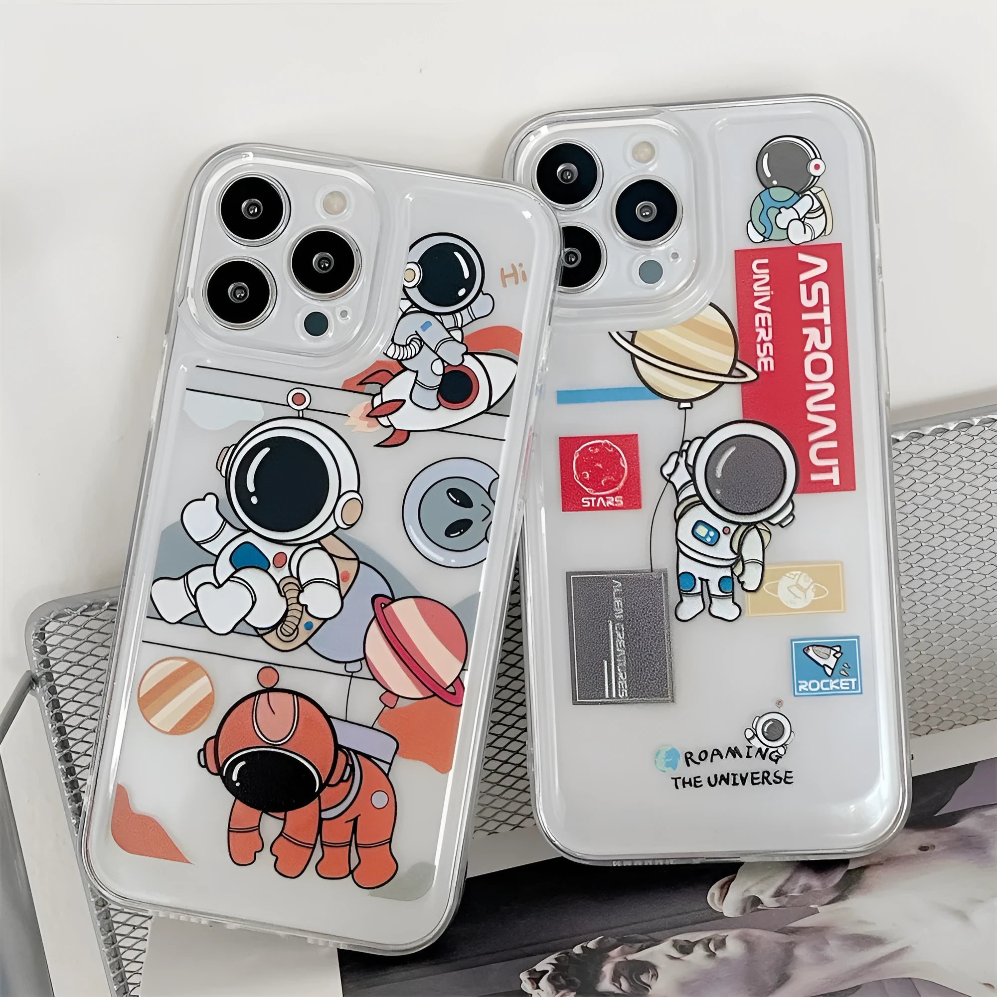 Transparent silicone phone case for iPhone 13 with cartoon astronaut and balloon graffiti design