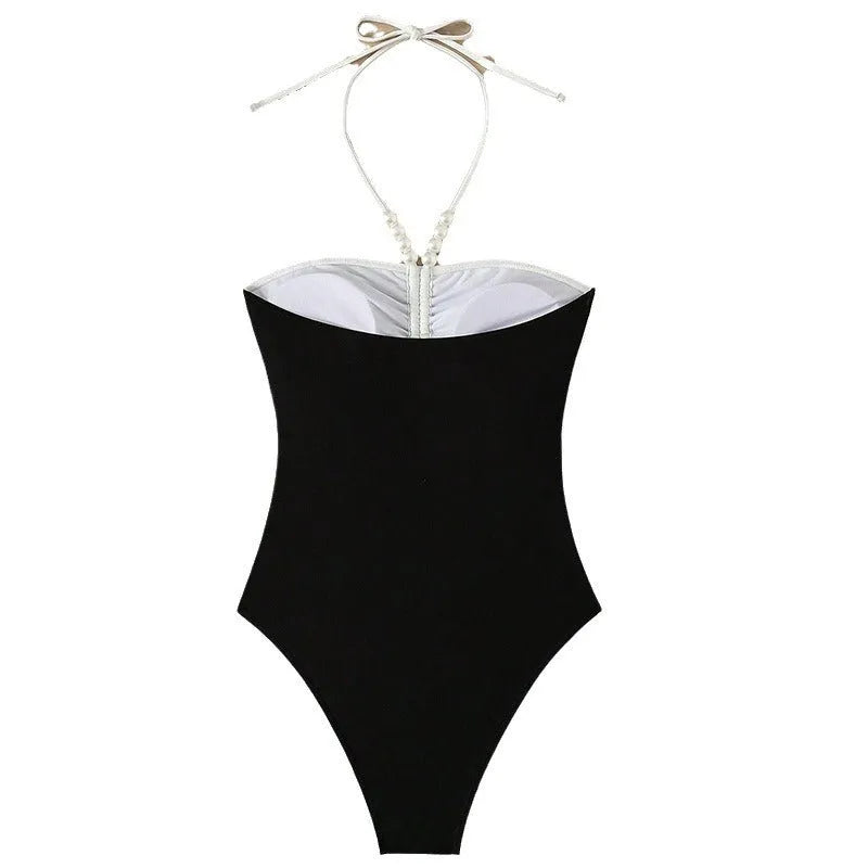 Women's black and white one-piece swimsuit with pearl spaghetti straps, slim-fitting nylon swimwear