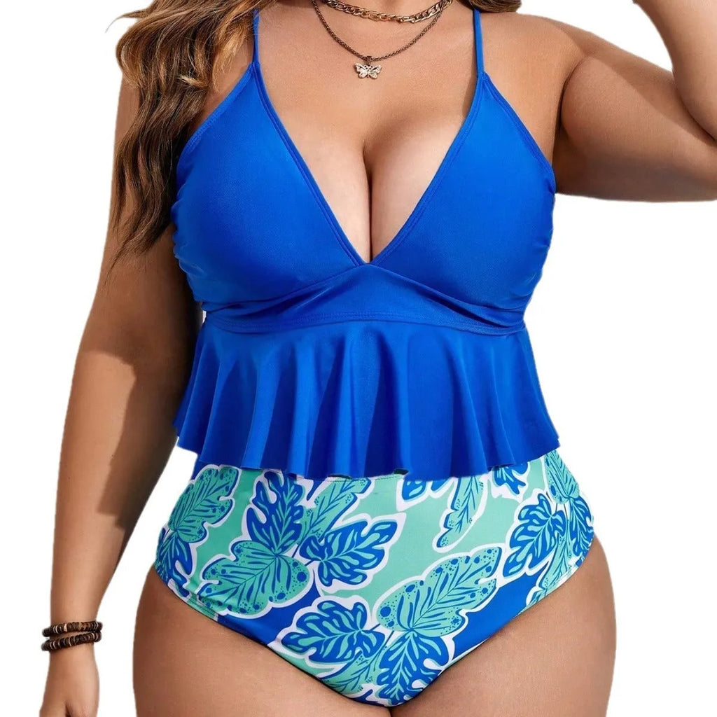 Blue two-piece bikini swimsuit set on a hanger, showing the briefs style and plus-size fit.
