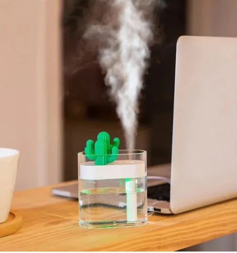Transparent green cactus portable USB humidifier on a desktop with cable, 120x45x93mm