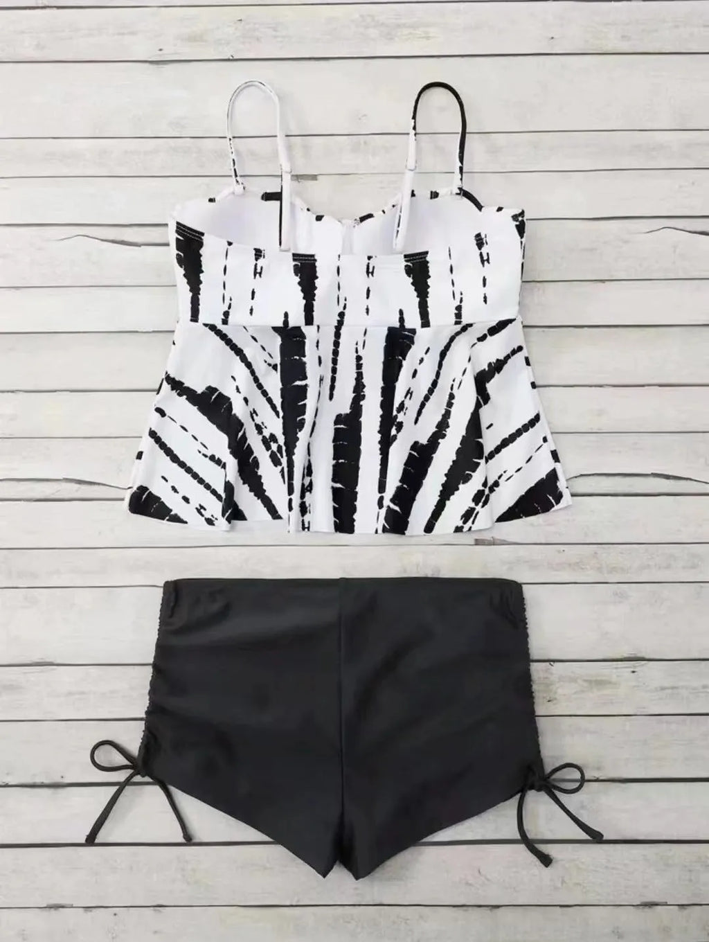 Women's printed split bikini swimsuit set showing top and shorts in blue colour option