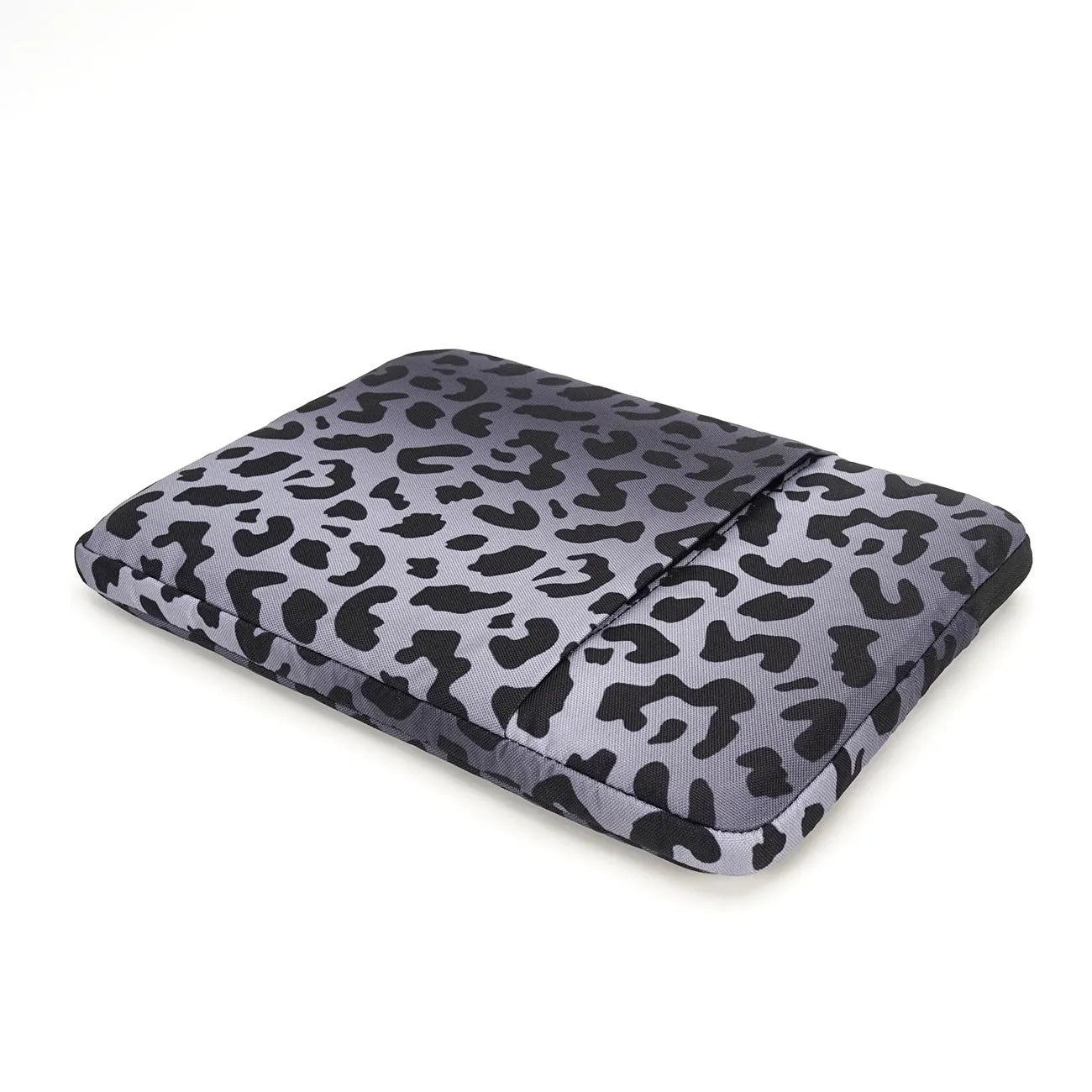 Leopard print laptop sleeve protecting 13-inch to 16-inch computers with waterproof polyester construction