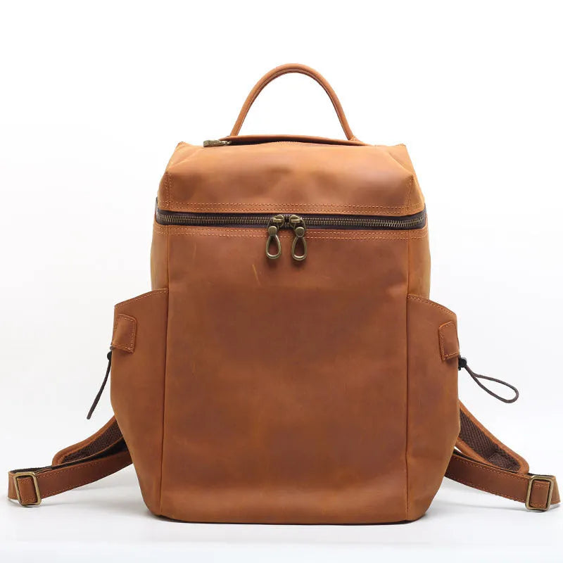 Classic retro backpack in brown Crazy Horse leather with exposed stitching and metal buckles