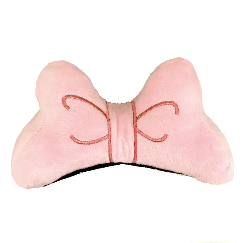 Soft plush bow tie helmet decoration in red, peach pink, or rose pink for motorcycle and ski helmets.