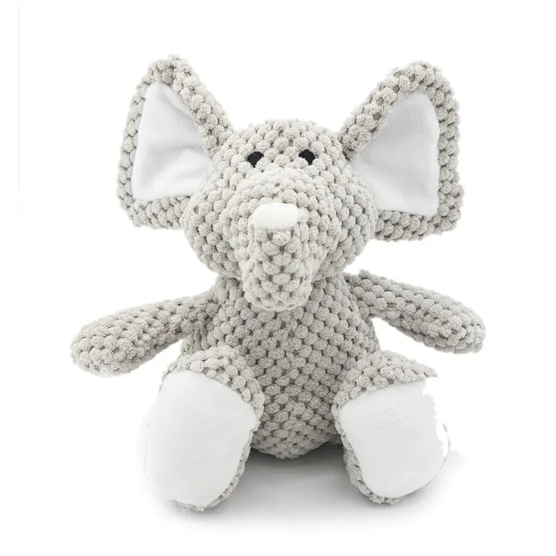 Small plush dog chew toy in animal shape with squeaker for interactive play and teeth cleaning