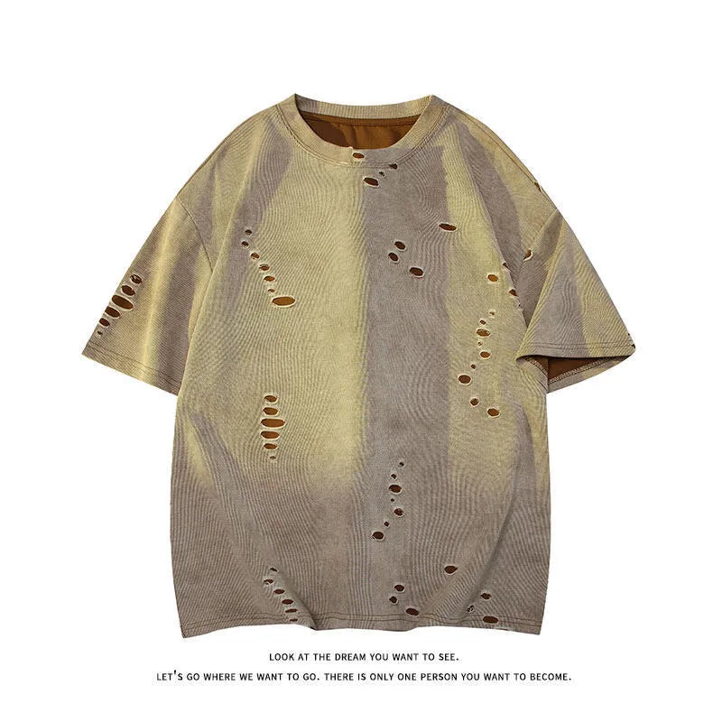 Men's blue cotton blend ripped short sleeve t-shirt showing relaxed fit and distressed detailing