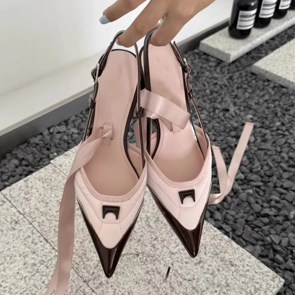 Women's special-shaped lace-up high heels in black and pink with a cowhide upper.