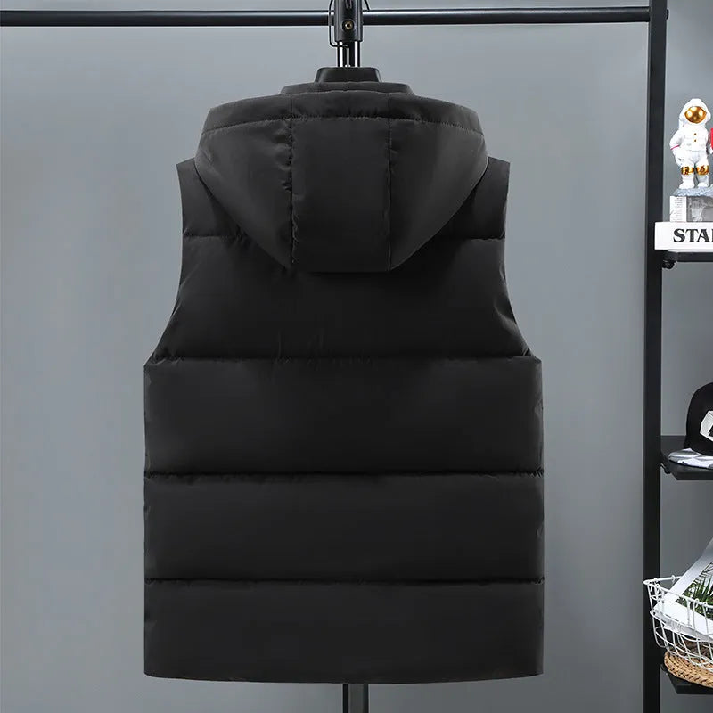 Men's solid blue fleece-lined vest with a detachable hood on a hanger.