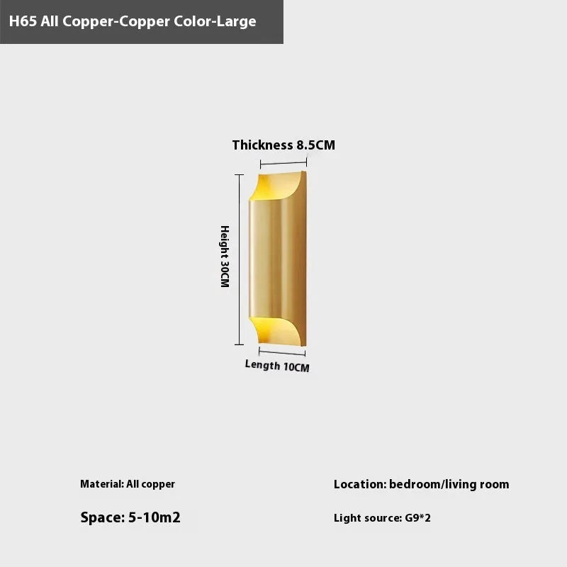 Minimalist copper wall lamp with black gold finish mounted beside bed