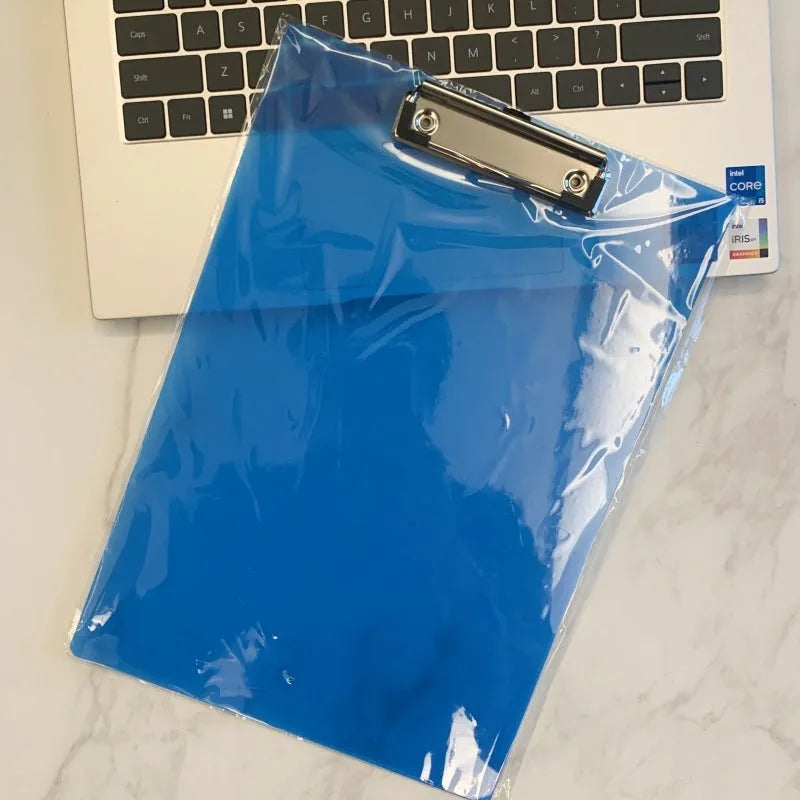 Transparent A4 writing board pad with metal clip holding paper, shown in blue colour option